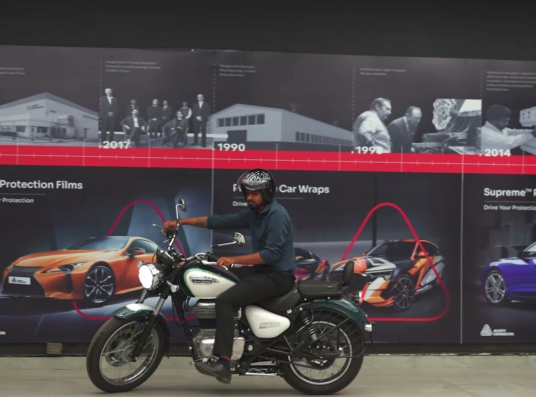 A motorcycle riding in through the GODS shutter.