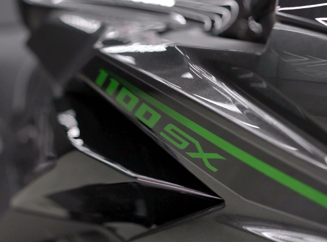 A finished Kawasaki Ninja under studio light.