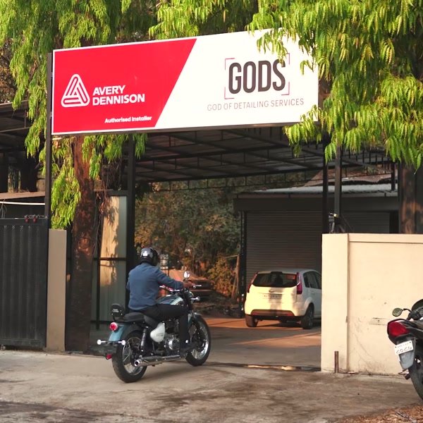 The GODS storefront, under its Avery Dennison sign.