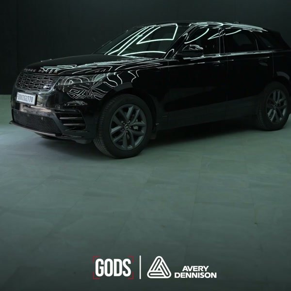Black Range Rover Velar outside the GODS studio.